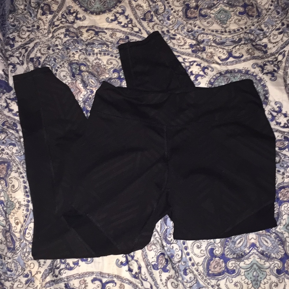 Black leggings with sheer cutouts